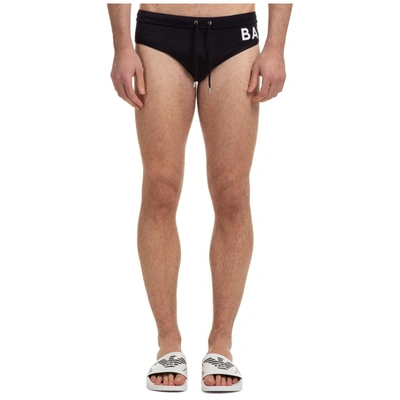 Shop Balmain Logo Print Swim Trunks In Black