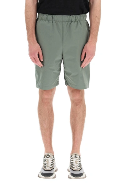 Shop Carhartt Wip Rear Logo Patch Track Shorts In Green