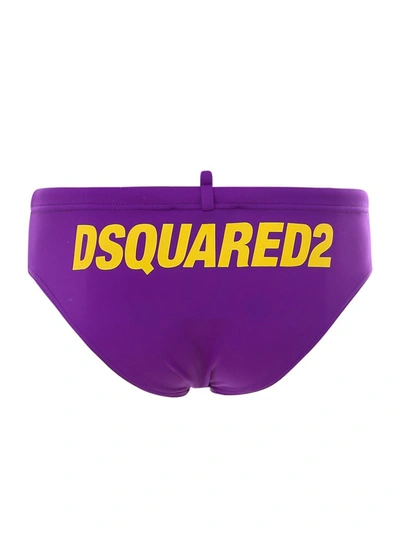 Shop Dsquared2 Rear Logo Print Swim Trunks In Purple