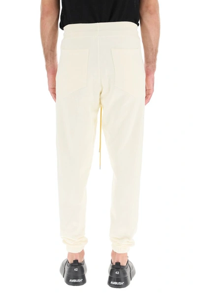 Shop Rhude Logo Embroidered Track Pants In White