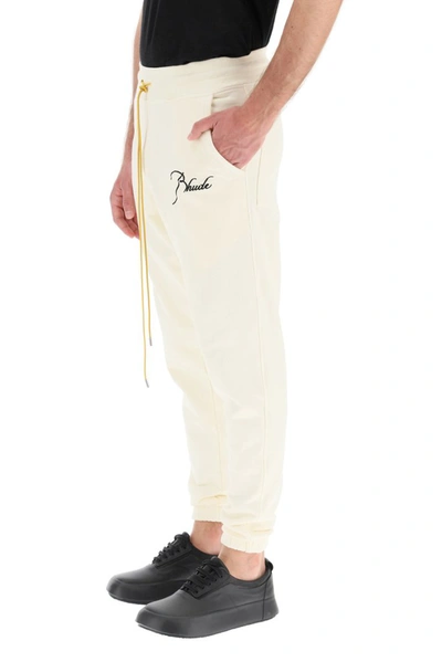 Shop Rhude Logo Embroidered Track Pants In White