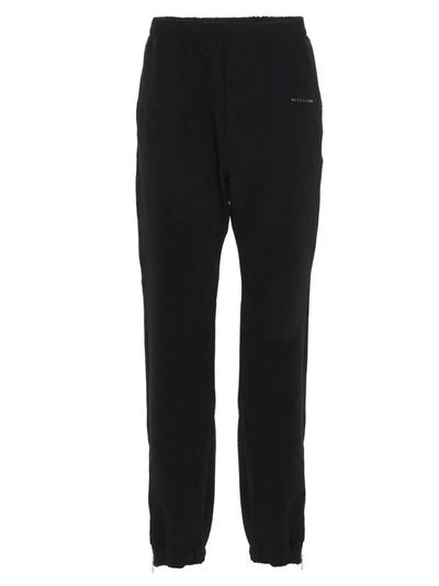 Shop Alyx 1017  9sm Stripe Panel Pants In Black