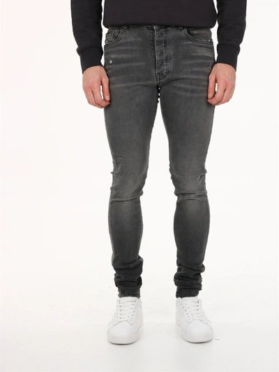 Shop Amiri Distressed Slim Jeans In Grey