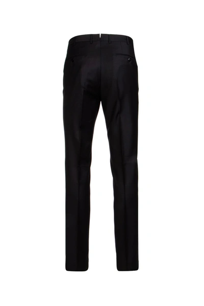 Shop Ermenegildo Zegna Tapered Trousers In Black