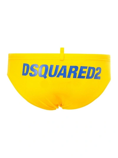Shop Dsquared2 Rear Logo Print Swim Trunks In Yellow