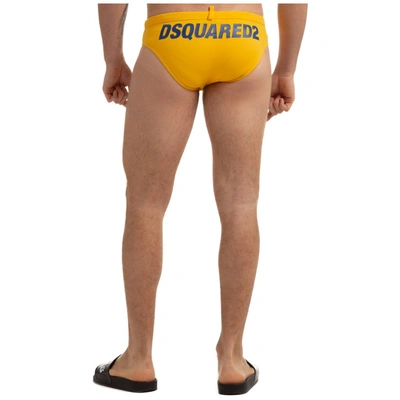 Shop Dsquared2 Rear Logo Print Swim Trunks In Yellow