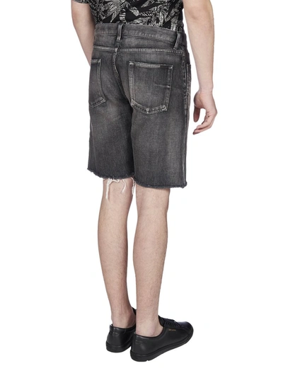 Shop Saint Laurent Frayed Hem Denim Shorts In Black