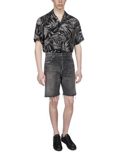 Shop Saint Laurent Frayed Hem Denim Shorts In Black