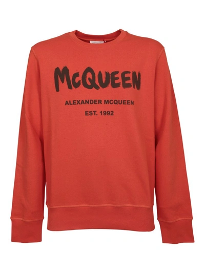 Shop Alexander Mcqueen Graffiti Logo Print Sweatshirt In Orange