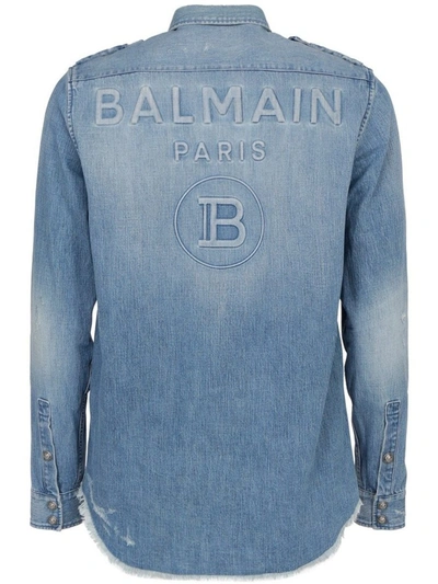 Shop Balmain Logo Embossed Denim Shirt In Blue