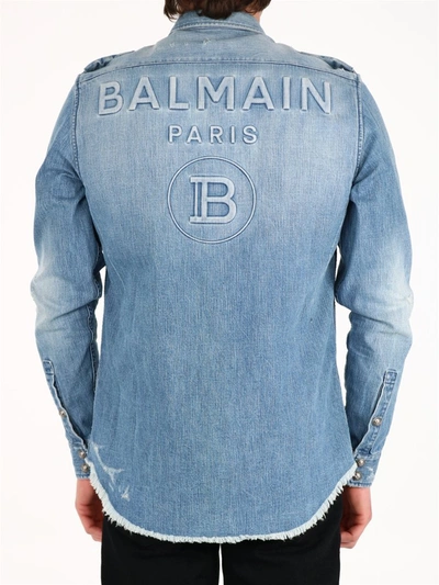 Shop Balmain Logo Embossed Denim Shirt In Blue