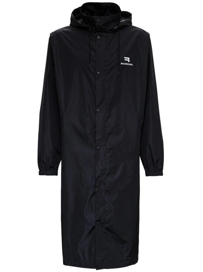 Shop Balenciaga Logo Printed Hooded Raincoat In Black