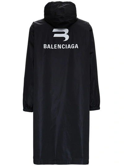 Shop Balenciaga Logo Printed Hooded Raincoat In Black