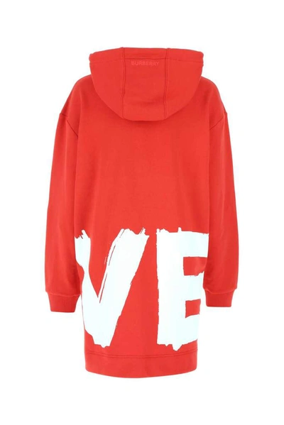 Shop Burberry Love Print Oversized Hoodie In Red
