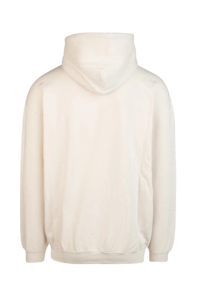 Shop Balenciaga Logo Embroidered Hoodie In Beige