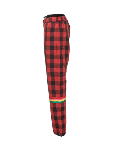 Shop Palm Angels Buffalo Checked Jogger Pants In Red