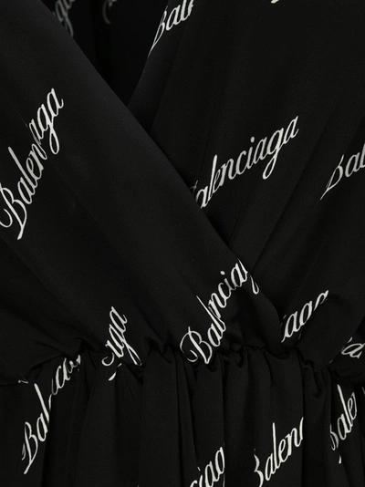 Shop Balenciaga Allover Logo Mini Dress In Black