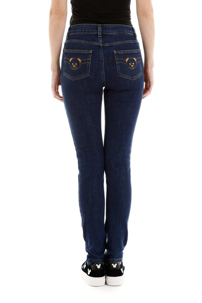 Shop Moschino Teddy Embroidered Skinny Jeans In Blue