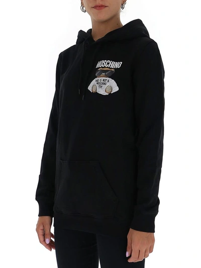 Shop Moschino Teddy Print Hoodie In Black