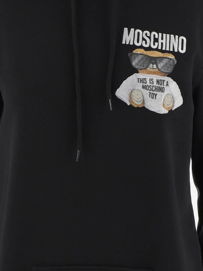 Shop Moschino Teddy Print Hoodie In Black