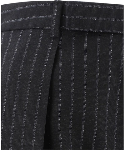 Shop Saint Laurent Pinstripe Pants In Black