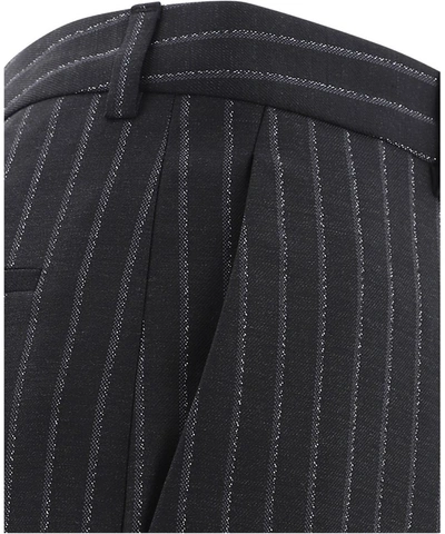 Shop Saint Laurent Pinstripe Pants In Black
