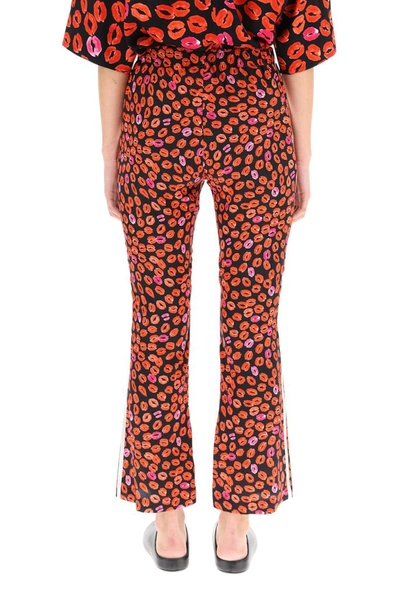 Shop Marni Lip Print Flared Trousers In Multi