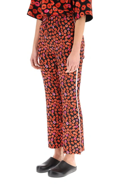 Shop Marni Lip Print Flared Trousers In Multi