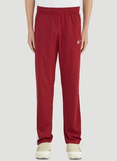 Shop Adidas By Human Made Firebird Track Pants In Red