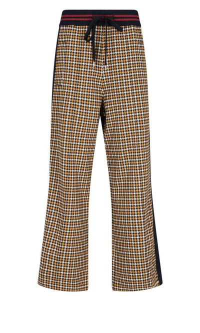 Shop Marni Contrast Side Stripe Check Print Trousers In Multi