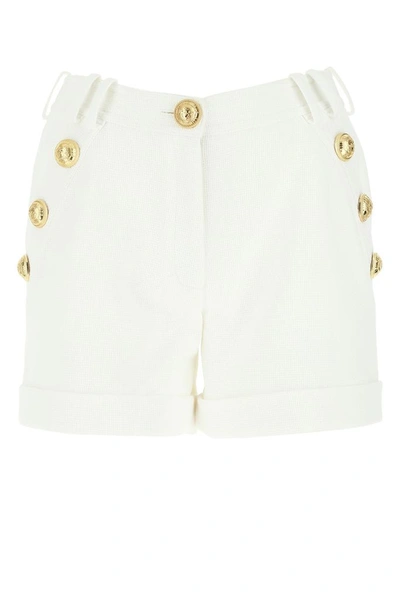 Shop Balmain Button Embellished Shorts In White