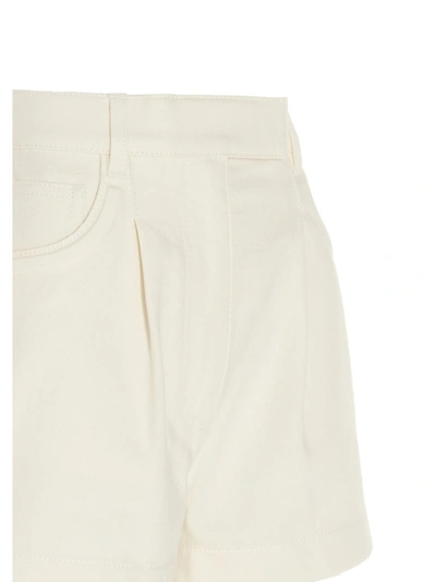 Shop Fendi Logo Embossed Denim Shorts In White