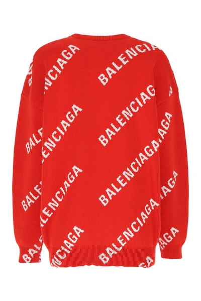 Shop Balenciaga All Over Logo Knit Sweater In Red