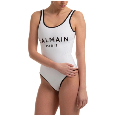 Shop Balmain Logo Printed Swimsuit In White