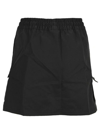 Shop Nike Swoosh Mini Skirt In Black