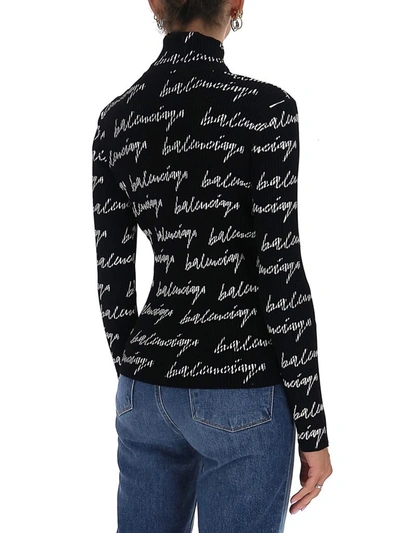 Shop Balenciaga Allover Logo Turtleneck Sweater In Black