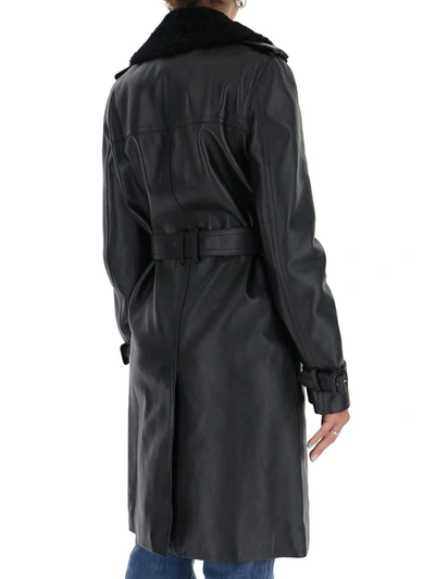 Shop Saint Laurent Belted Leather Trench Coat In Black