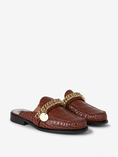 Shop Givenchy Chain Detail Embossed Loafers In Brown