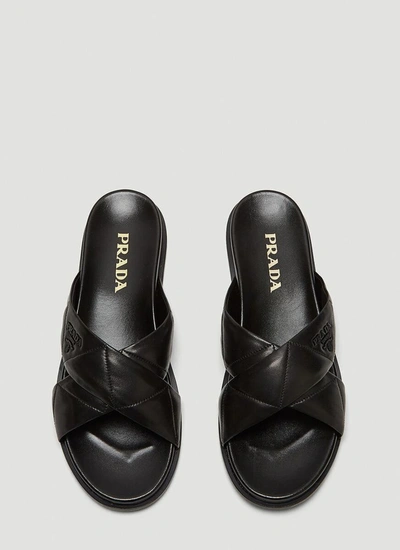 Shop Prada Logo Quilted Crossover Slides In Black