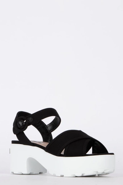 Shop Miu Miu Crossed Strap Chunky Sole Sandals In Black