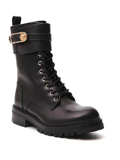 Shop Versace Medusa Safety Pin Buckle Combat Boots In Black