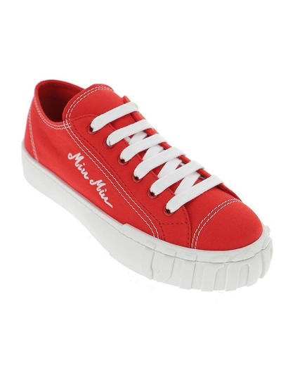 Shop Miu Miu Logo Embroidered Sneakers In Red