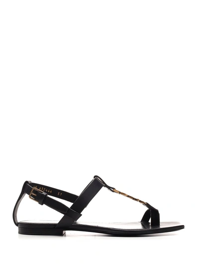 Shop Saint Laurent Cassandra Flat Sandals In Black