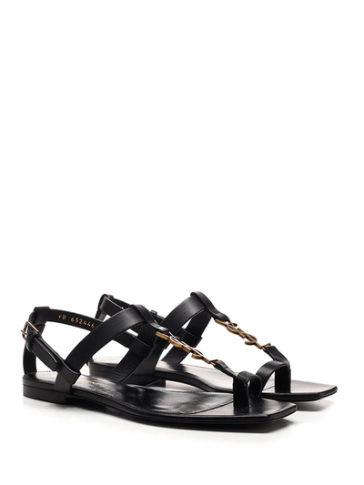 Shop Saint Laurent Cassandra Flat Sandals In Black