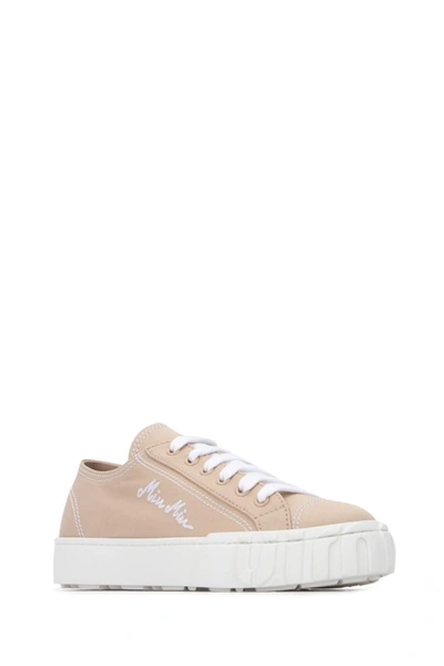 Shop Miu Miu Logo Embroidered Sneakers In Beige