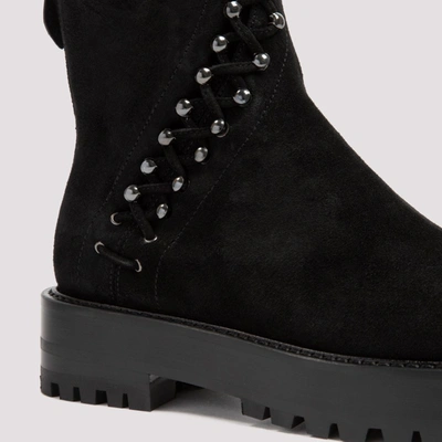 Shop Alaïa Studded Lace Up Ankle Boots In Black