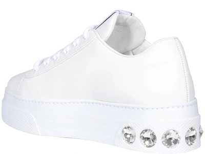 Shop Miu Miu Crystal Embellished Heel Sneakers In White