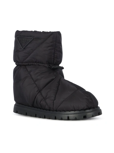 Shop Prada Triangle Logo Padded Boots In Black