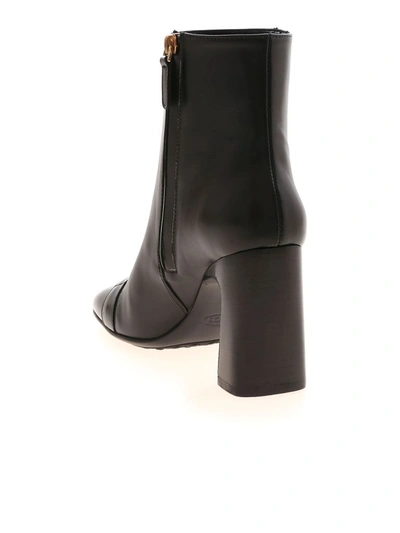 Shop Tod's Buckle Embellished Ankle Boots In Black