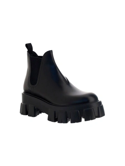 Shop Prada Monolith Ankle Boots In Black
